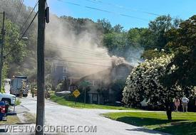 Engine 44-5 on scene of a working house fire in the unit block of Green Street in Westwood.